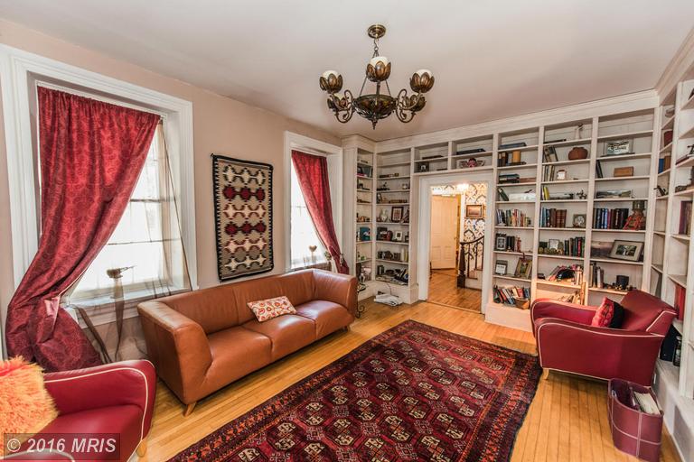 Family room and library picture of The Thomas Shepherd House in Shepherdstown, West Virginia and located at 211 East High Street, presented as a real estate listing from Adam Miller, REALTOR.