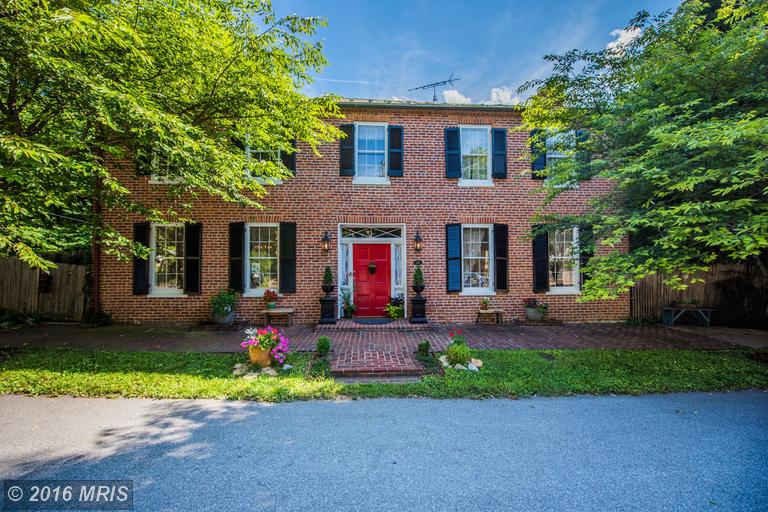 Front picture of The Thomas Shepherd House in Shepherdstown, West Virginia and located at 211 East High Street, presented as a real estate listing from Adam Miller, REALTOR.